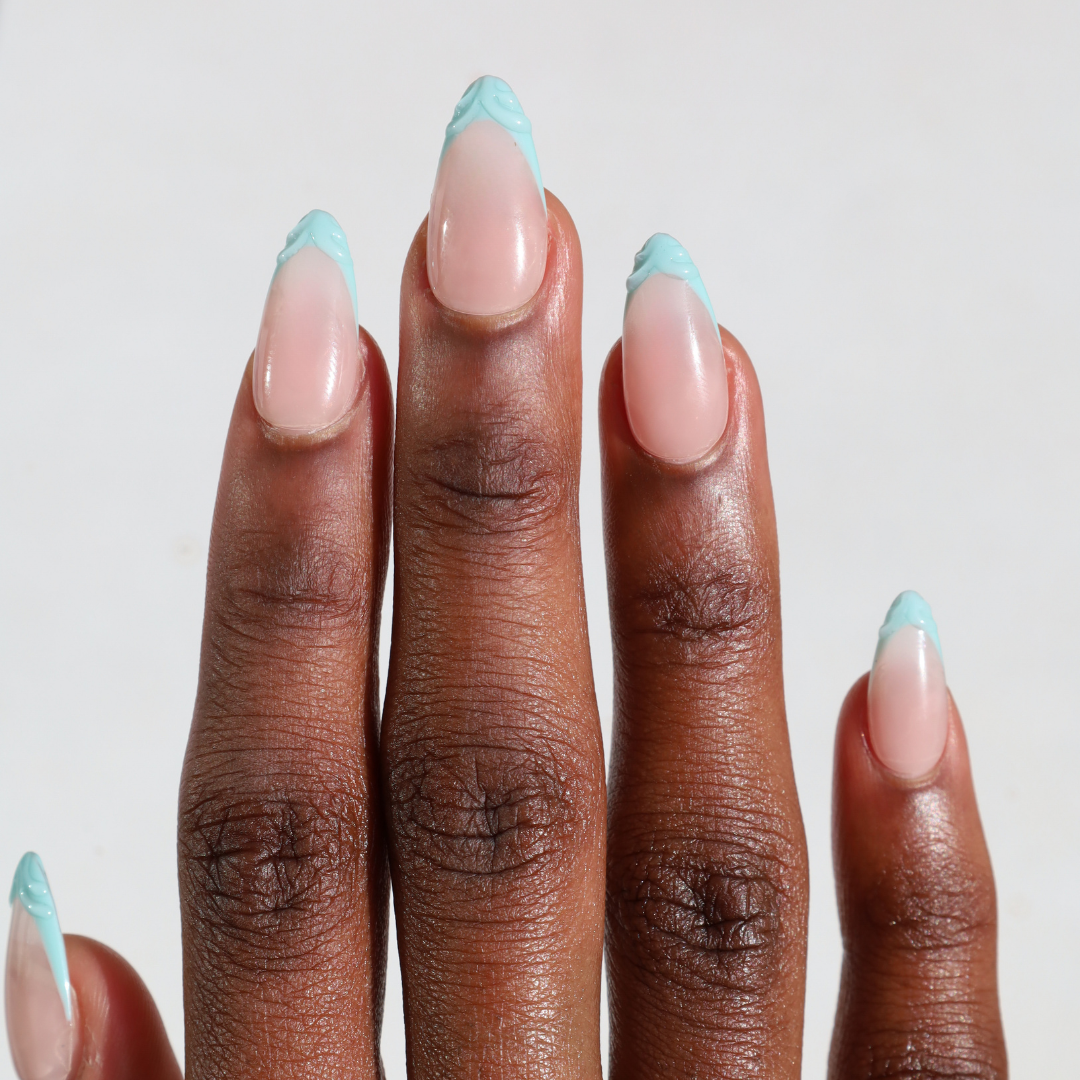 Dark skinned hand with Mermaid 3D French Tip Nails